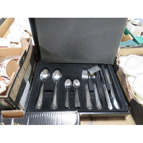 59 - Three trays of assorted ceramics and glass with a box of Gourmet Pride cutlery