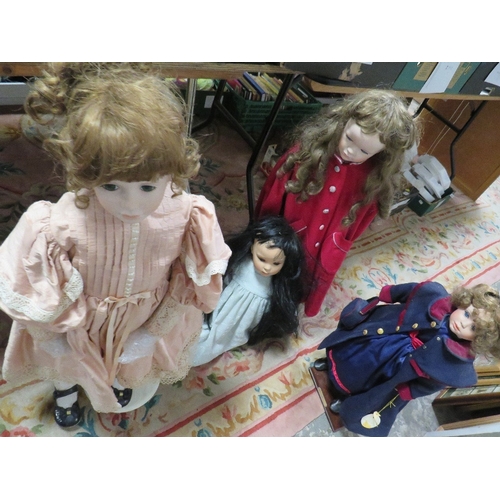 64 - A selection of large modern collectors dolls