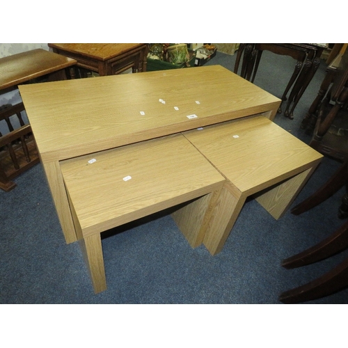 745 - A modern oak effect nest of three tables