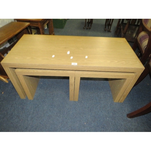 745 - A modern oak effect nest of three tables