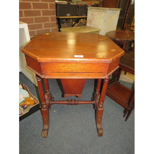 746 - An antique oak sewing table