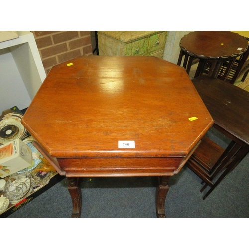 746 - An antique oak sewing table