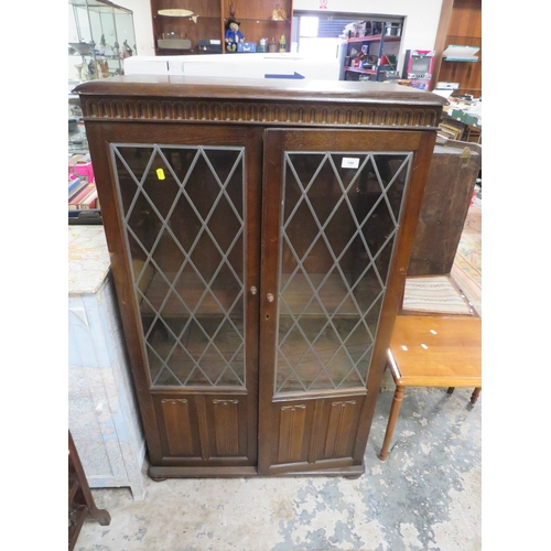 749 - A leaded glazed bookcase