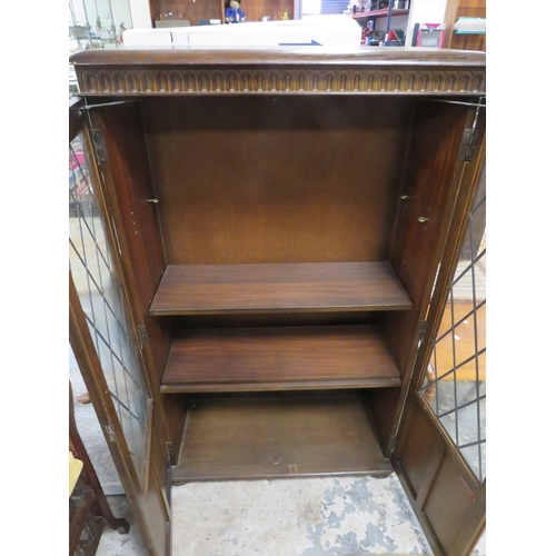 749 - A leaded glazed bookcase