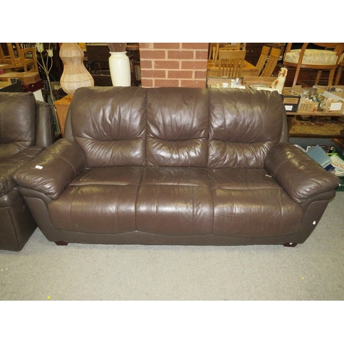 751 - A two piece brown leather style suite