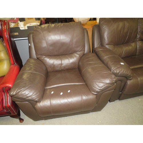 751 - A two piece brown leather style suite