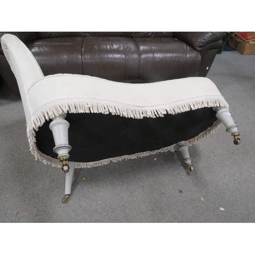 752 - A shaped upholstered small chaise longue