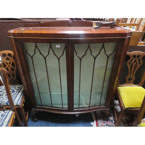 765 - An early 20th century mahogany display cabinet - one loose leg