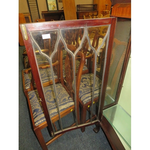 765 - An early 20th century mahogany display cabinet - one loose leg