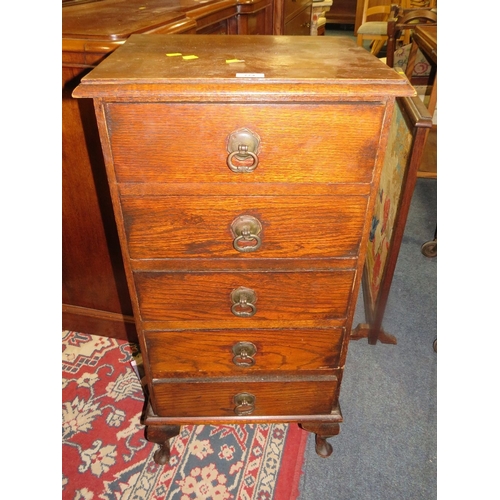 774 - A vintage narrow oak five drawer chest W 46 cm