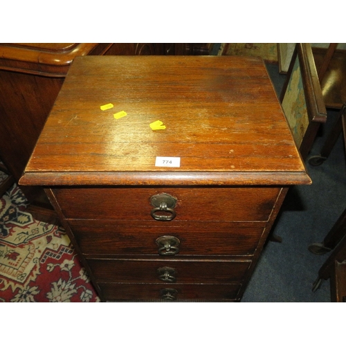 774 - A vintage narrow oak five drawer chest W 46 cm