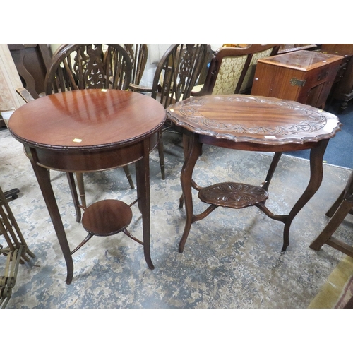 782 - A carved mahogany two tier occasional table together with a circular example. (2)