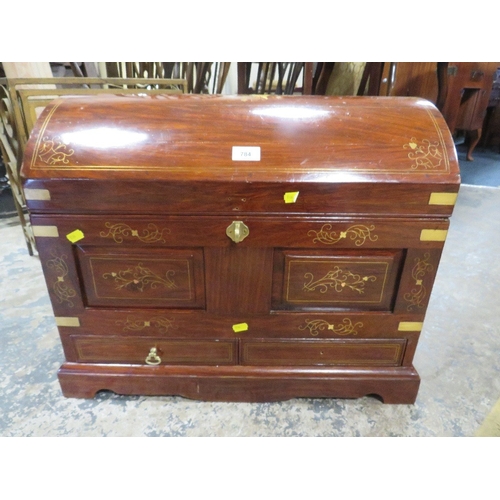 784 - A modern hardwood and brass inlaid domed casket W 66 cm