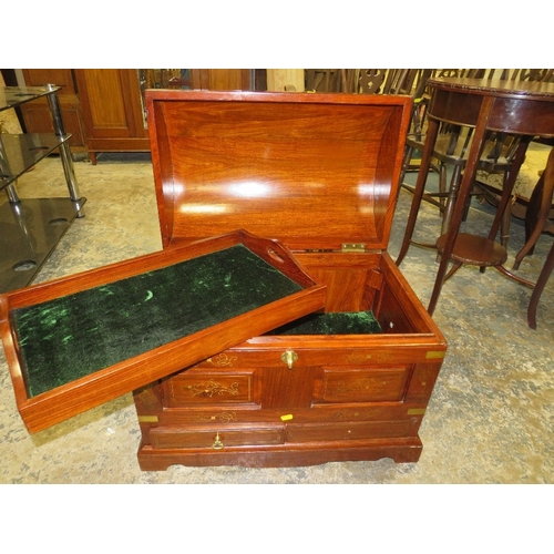 784 - A modern hardwood and brass inlaid domed casket W 66 cm