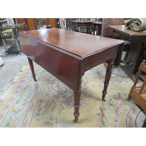 785 - An antique mahogany pembroke table