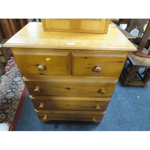 788 - A honey pine five drawer chest together with a two door light oak cabinet. (2)