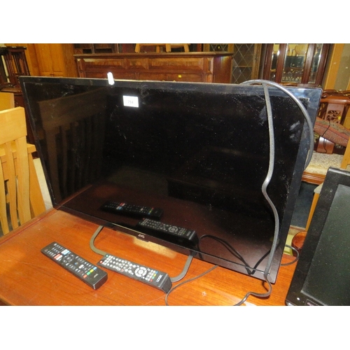 794 - A JVC 31” flatscreen tv together with a smaller Logik example - remotes - House Clearance