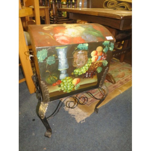 787 - A painted domed casket on wrought stand