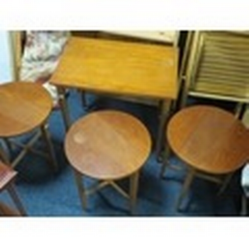 811 - A retro teak nest of three tables