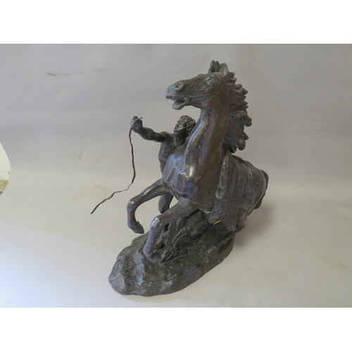 182 - A spelter style figure of a man on a horse