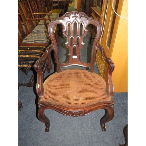 773 - A pair of antique mahogany carved bergere seat armchairs A/F