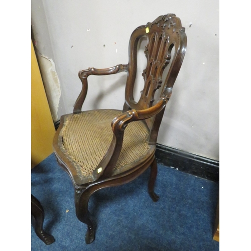 773 - A pair of antique mahogany carved bergere seat armchairs A/F