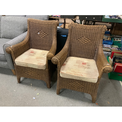 747 - A pair of wicker armchairs