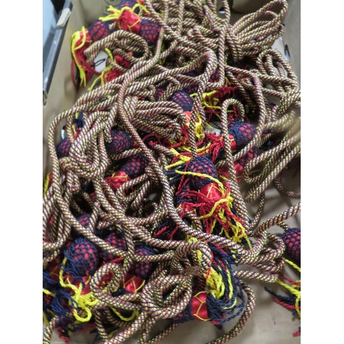 100 - A tray of military bugle rope braid