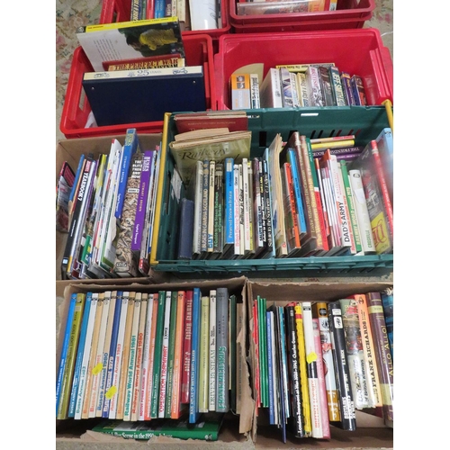 112 - A large quantity of books over several trays to include many hardback war and railway related books