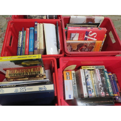 112 - A large quantity of books over several trays to include many hardback war and railway related books