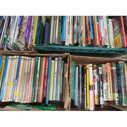 112 - A large quantity of books over several trays to include many hardback war and railway related books