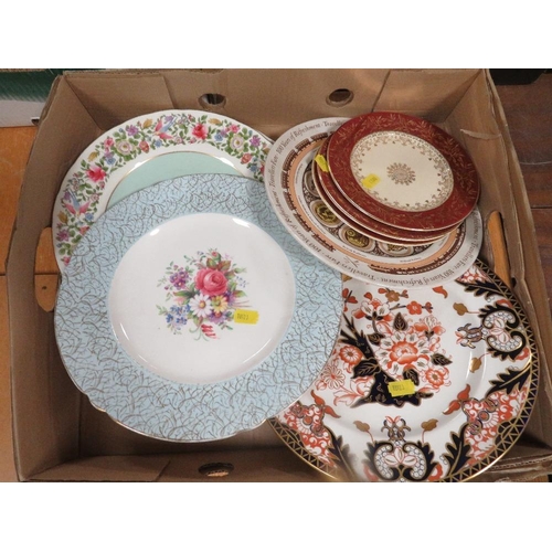 127 - A tray of assorted plates to include Royal Crown Derby examples