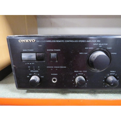 160 - A  Onkyo AV receiver TX-SR806 together with a wireless remote control amplifier R1 and a pair of spe... 