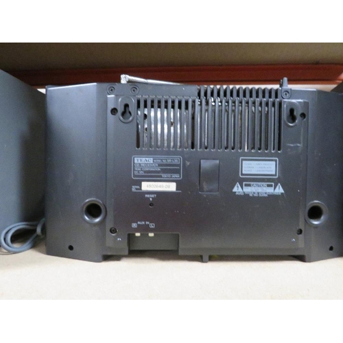 166 - A Teac compact disk player and two amplifiers ?