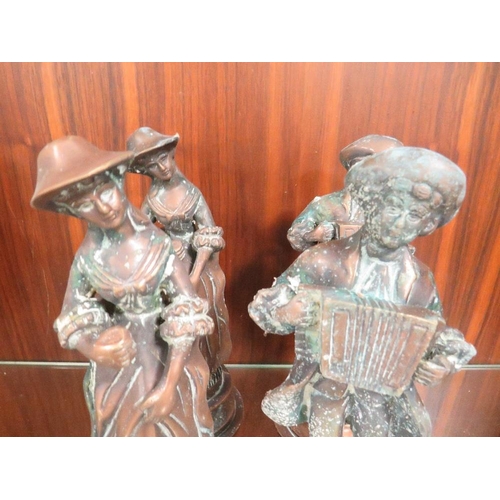 191 - Four cast metal figures