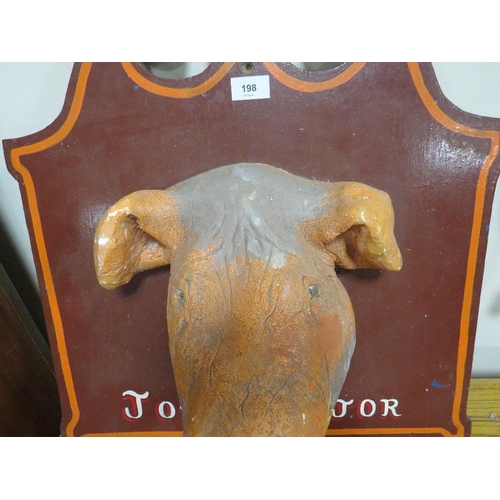 198 - A vintage plaster study of a pigs head on a wooden plaque titles 'John Major', inscribed verso 'Norm... 