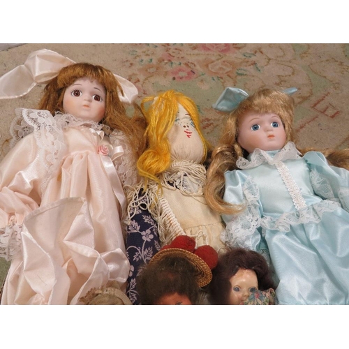 58 - A tray of assorted dolls and soft toys