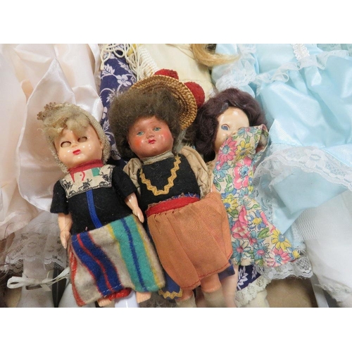 58 - A tray of assorted dolls and soft toys