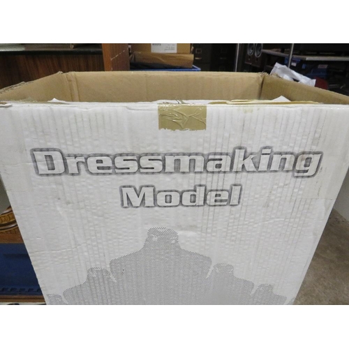 77 - A boxed adjustable mannequin