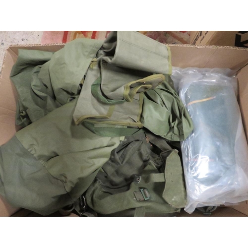 81 - Two boxes of militaria, to include vintage webbing