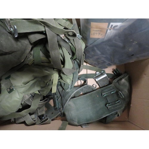 81 - Two boxes of militaria, to include vintage webbing