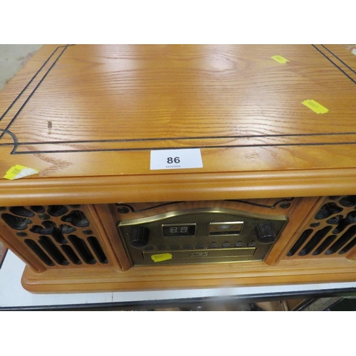 86 - A reproduction turn table radio/cd cassette player