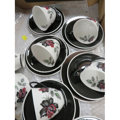 97 - A Royal Albert Masquerade tea set, coffee pot, milk and sugar, cake plate, 6 cups/saucers