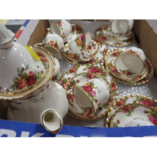 98 - A Royal Albert Old Country Roses tea set, tea pot, milk and sugar, 6 side plates, 6 cups/saucers