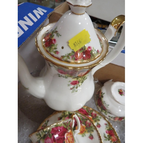 98 - A Royal Albert Old Country Roses tea set, tea pot, milk and sugar, 6 side plates, 6 cups/saucers