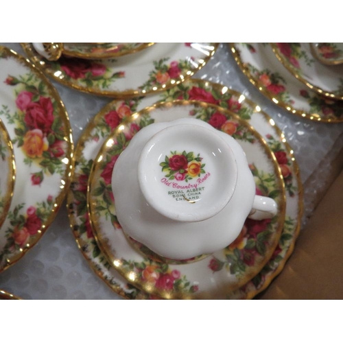 98 - A Royal Albert Old Country Roses tea set, tea pot, milk and sugar, 6 side plates, 6 cups/saucers