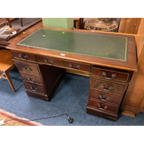 769 - A leather topped twin pedestal desk