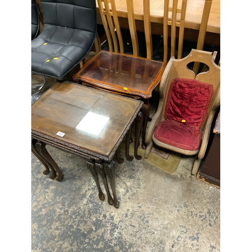 778 - An unusual rocking chair together with two glass topped nests of tables (3)