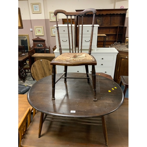 800 - An Ercol oval coffee table (minus badge) together with a bedroom chair. (2)