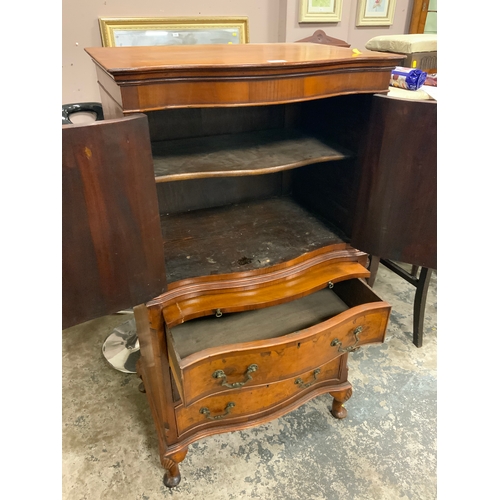 809 - A walnut serpentine fronted drinks cabinet on chest H 125 cm W 68 cm